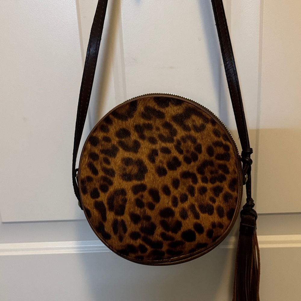 Patricia Nash Scafati canteen bag with leopard print calfhair front.